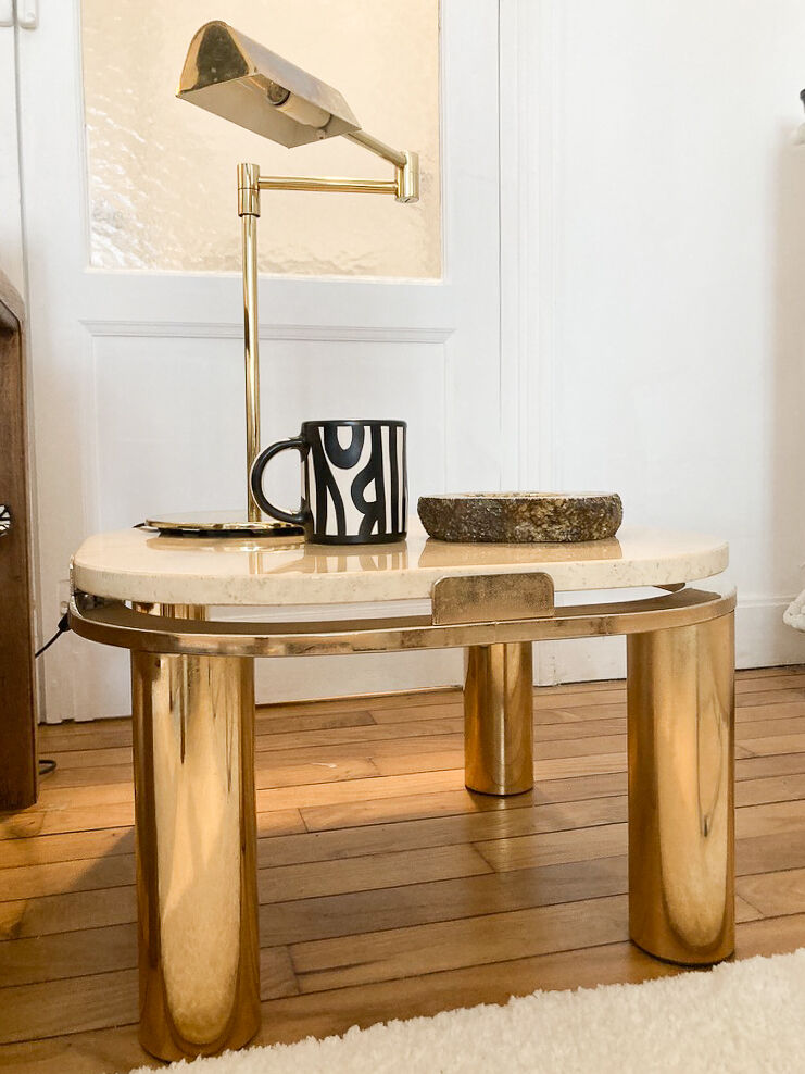 Travertine side table and vintage brass
