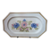 Rectangular earthenware dish with a glazed finish, decorated with a bouquet of flowers.