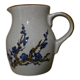 Blue-flowered sandstone jug