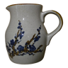 Blue-flowered sandstone jug