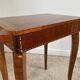 Small marquetry pedestal table with key storage