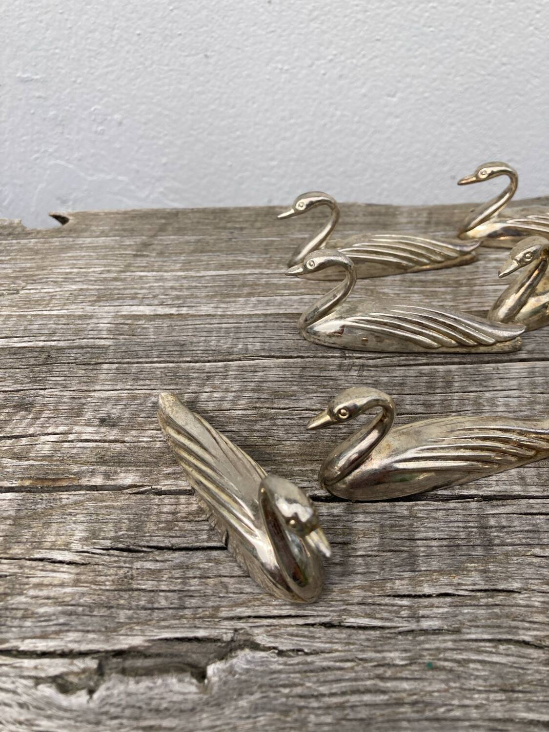 12 duck knife holders in silver metal
