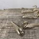 12 duck knife holders in silver metal