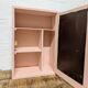 Small pink bathroom cabinet