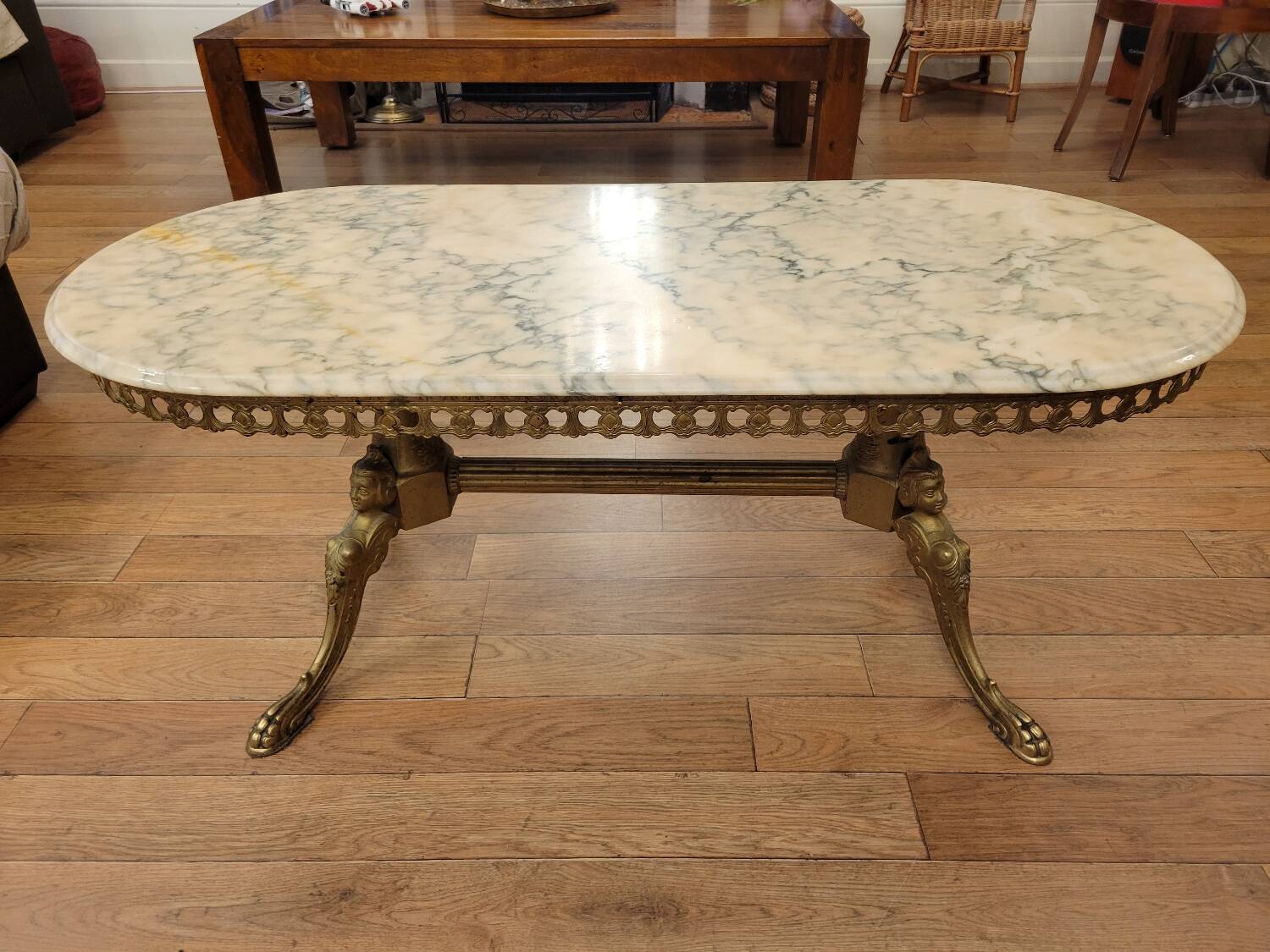 Coffee table in gilded bronze and marble