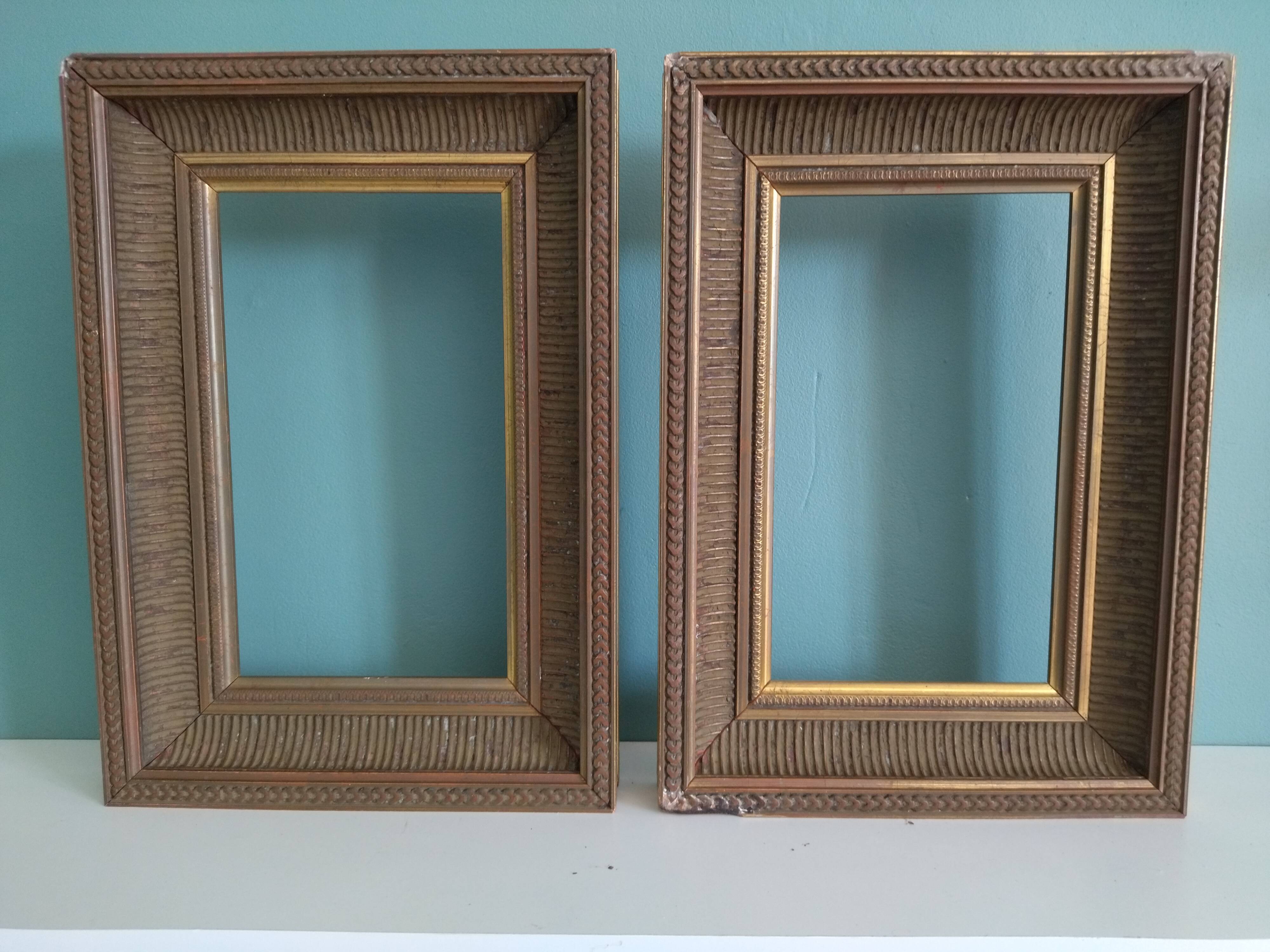 Pair of frames in old carved wood
