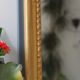 Miroir doré longiligne ancien à la feuille d'or et teinte grise 36x121cm