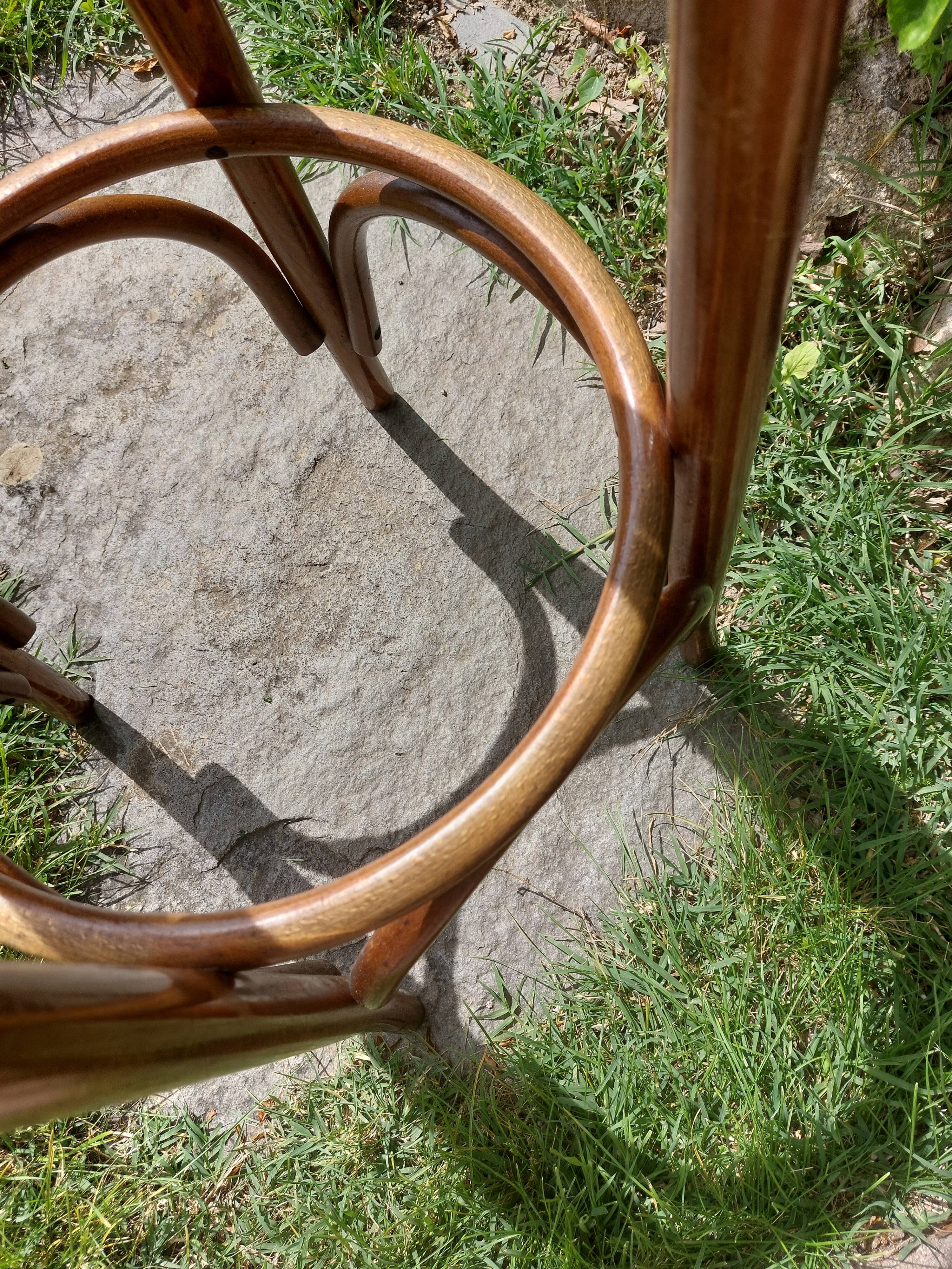curved wooden bar stool