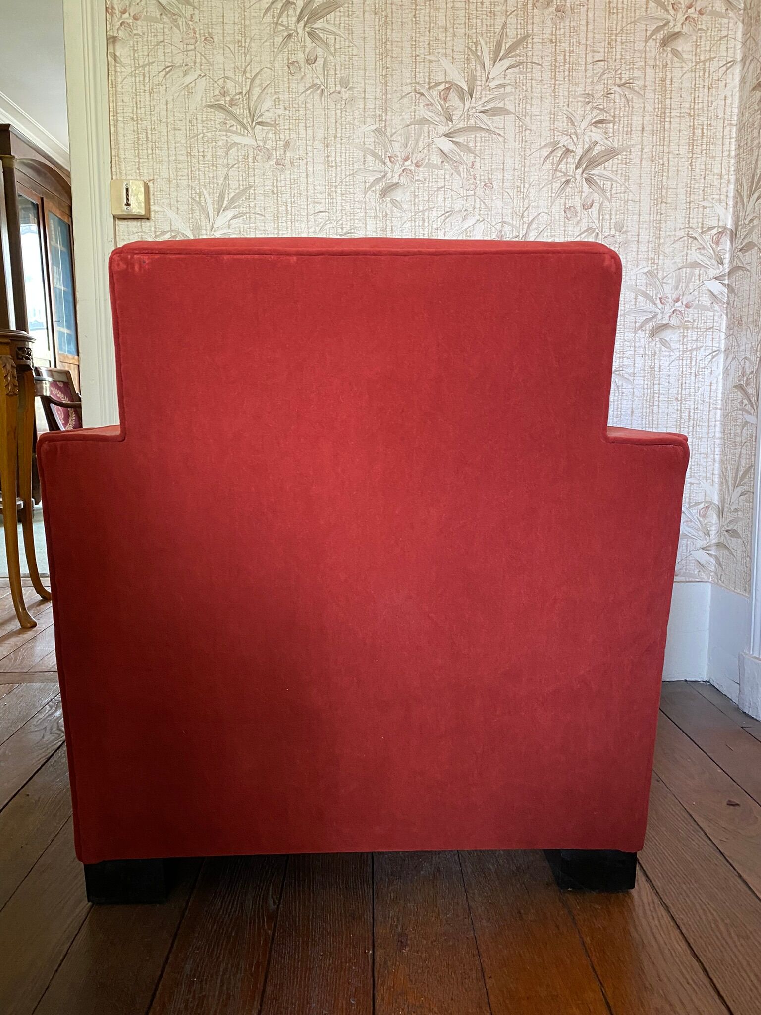 Vintage cubic armchair covered with red fabric
