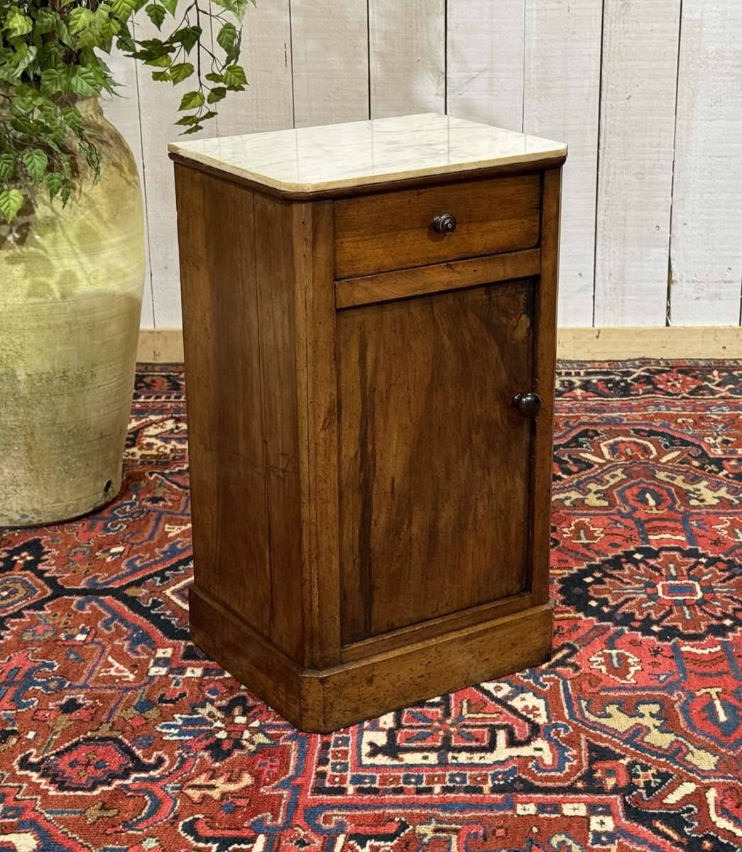 Nightstand in walnut with a white marble top, 19th century.