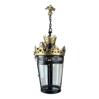 Large iron lantern in the shape of an inverted cone with gilded crown with gold leaf