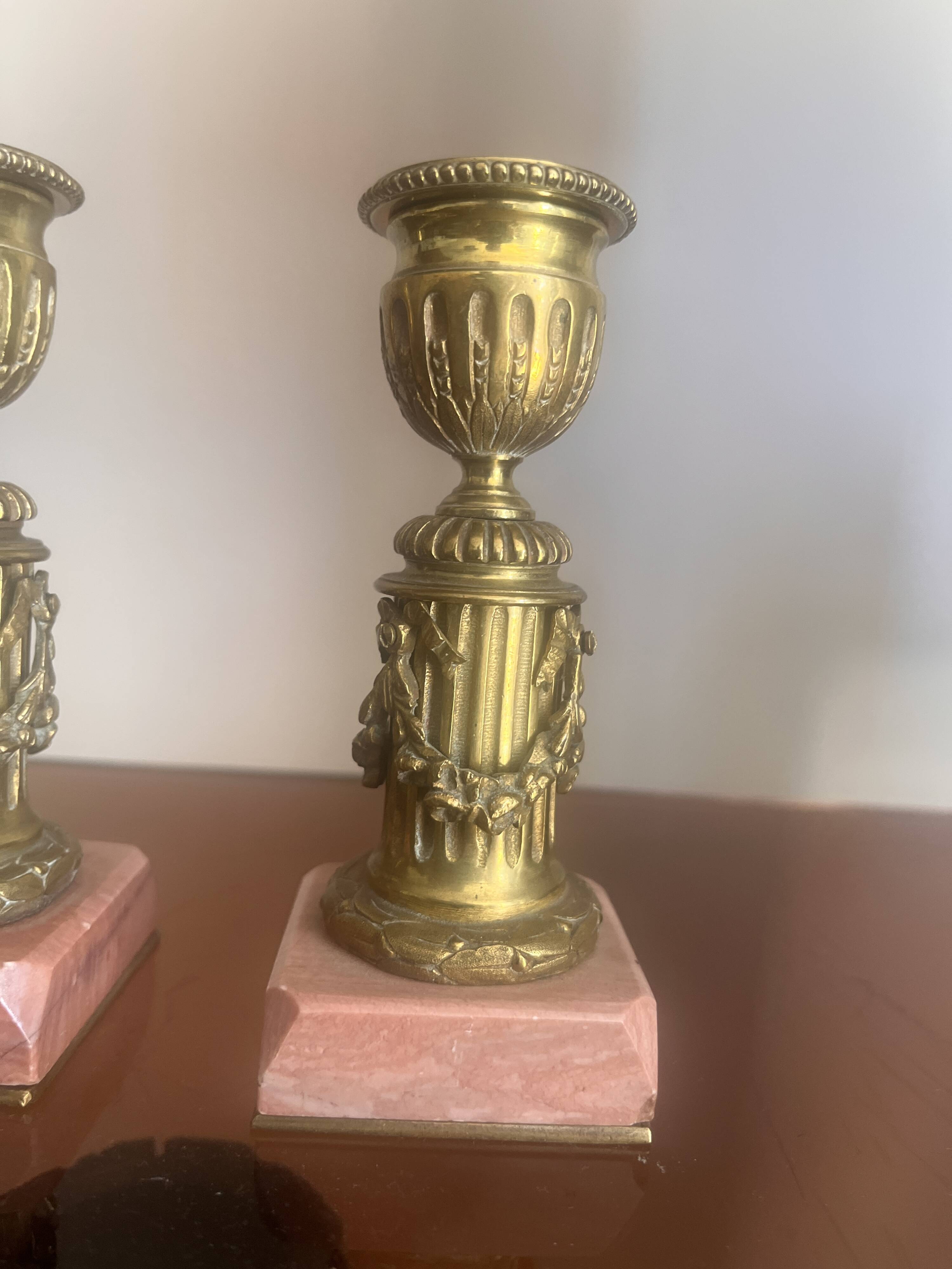 pair of antique bronze candlesticks