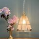 Suspension tulipe vintage en verre blanc et or