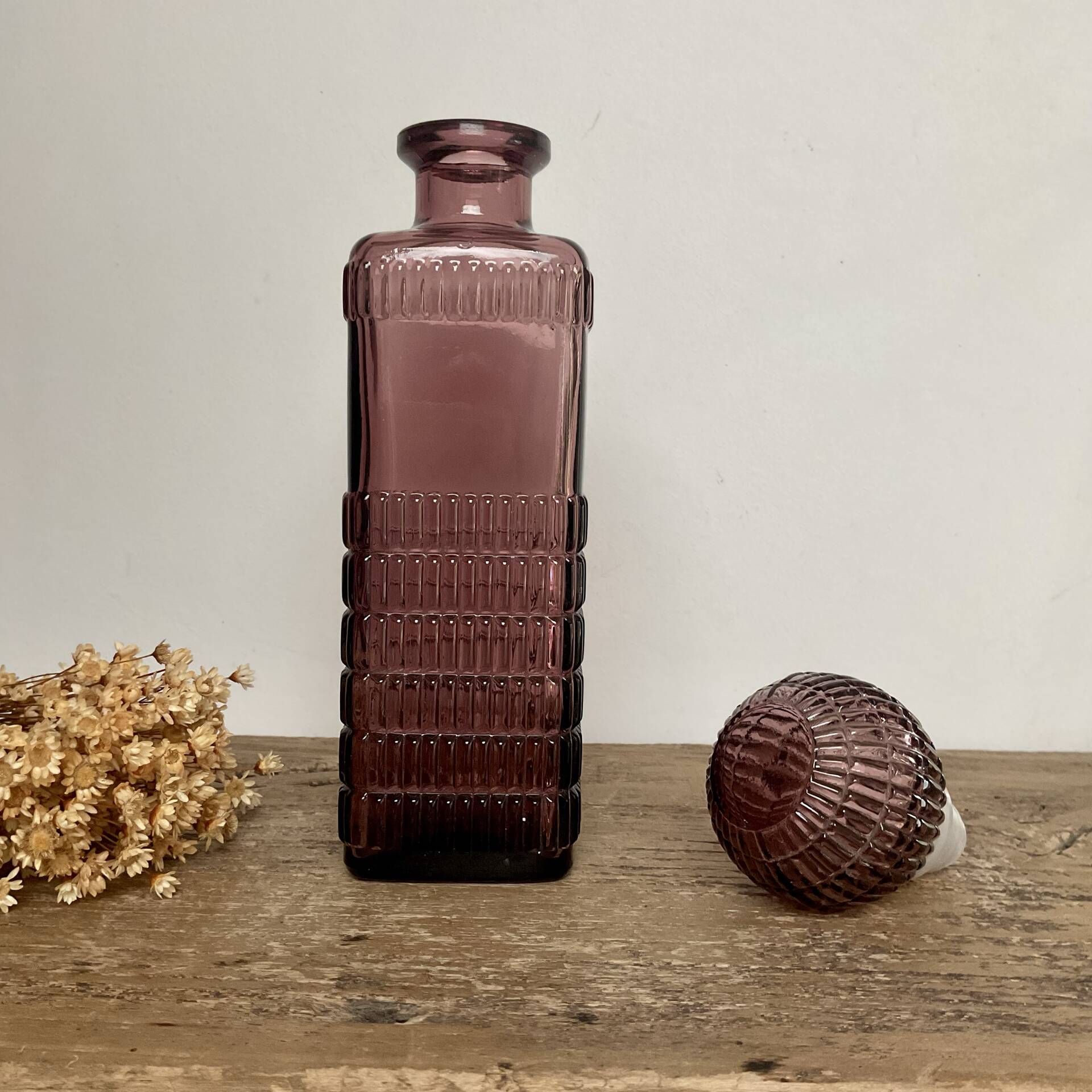 Plum glass bottle
