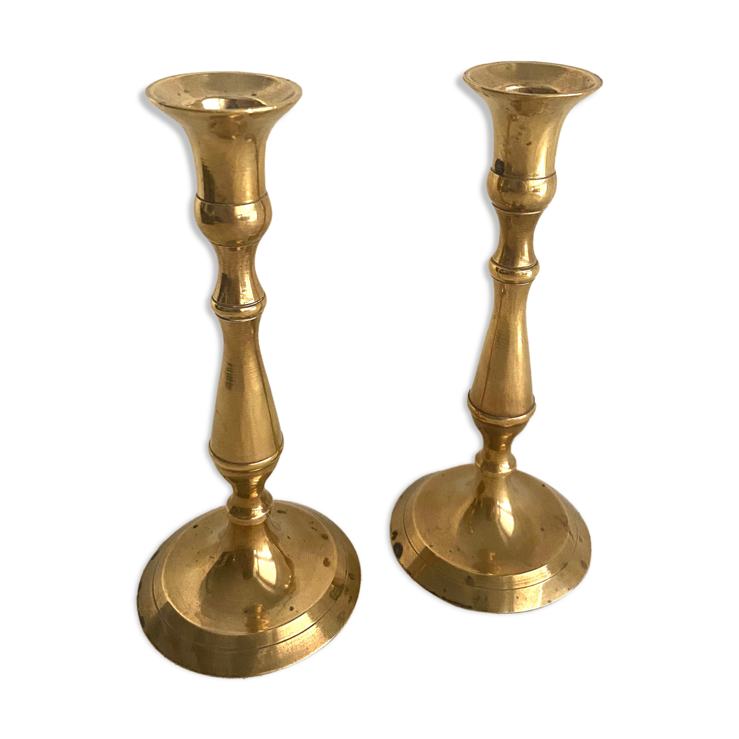 Duo of brass candle holders