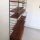 Self-supporting modular wall shelf