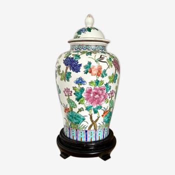 Chinese enamelled earthenware jar with wooden base