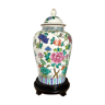 Chinese enamelled earthenware jar with wooden base