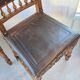 Pair of antique chairs in embossed leather, Henri II style.