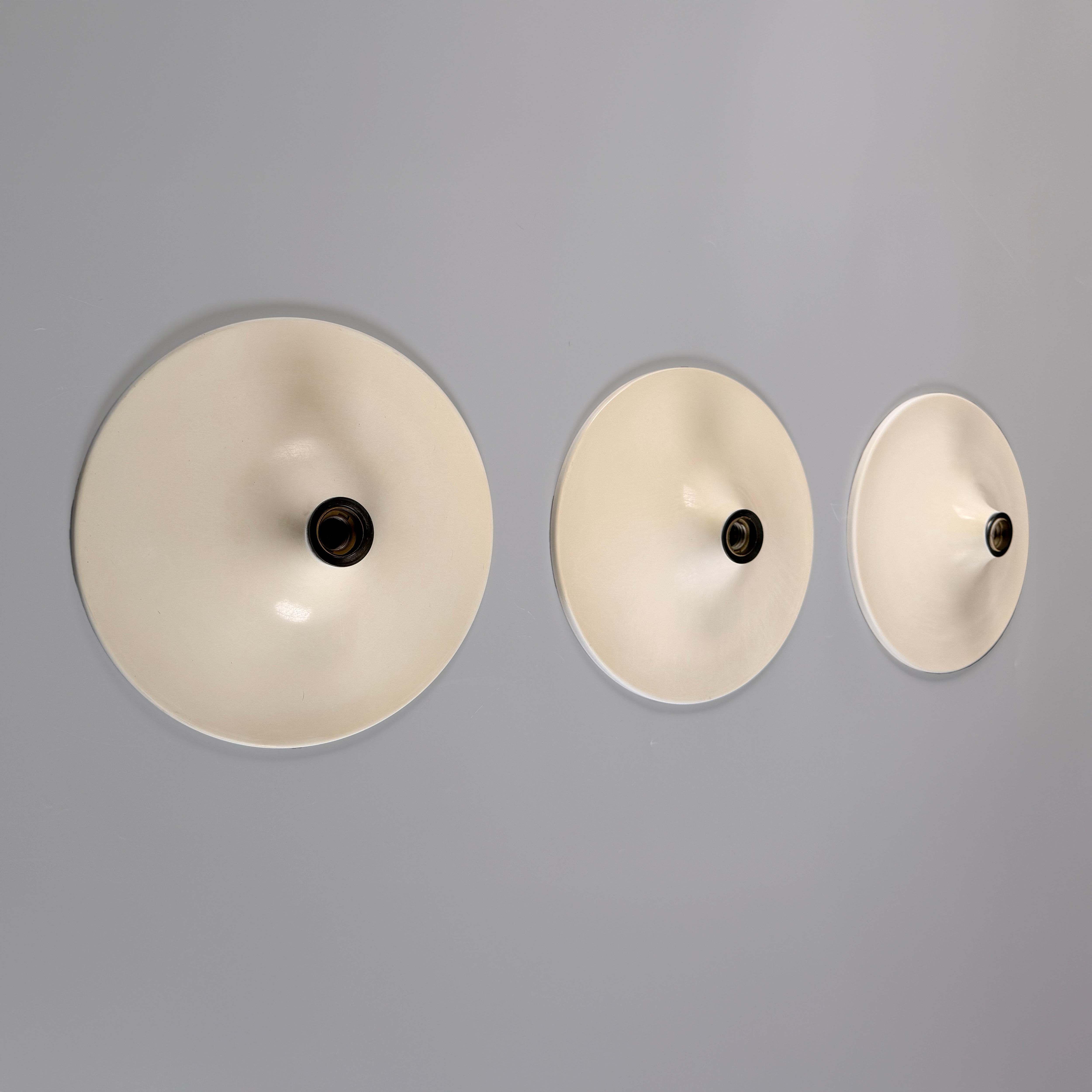 Set of 3 vintage disc wall lamps, 'Charlotte Perriand' for 'Les Arcs', 1970s.