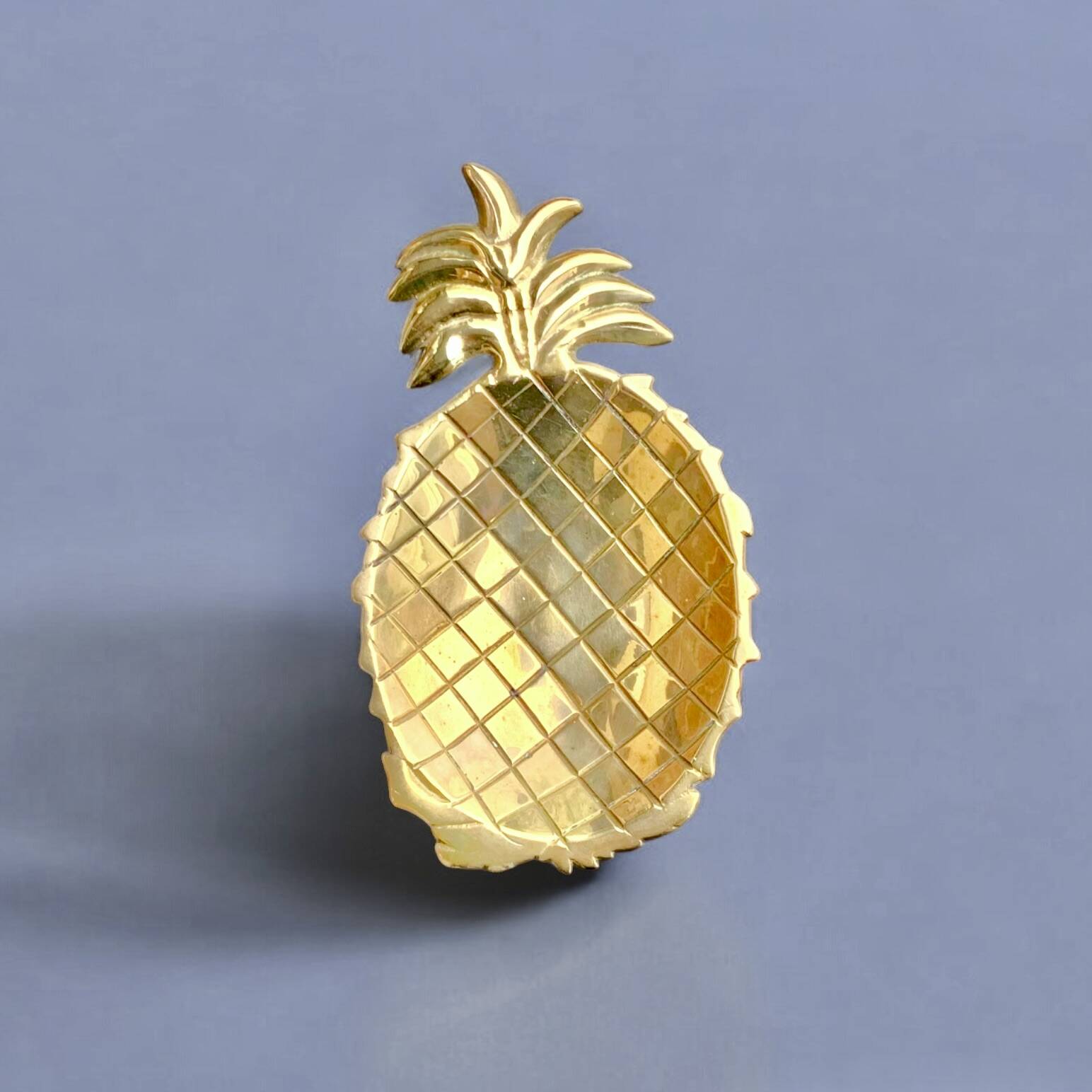 Vintage brass pineapple pocket emptier