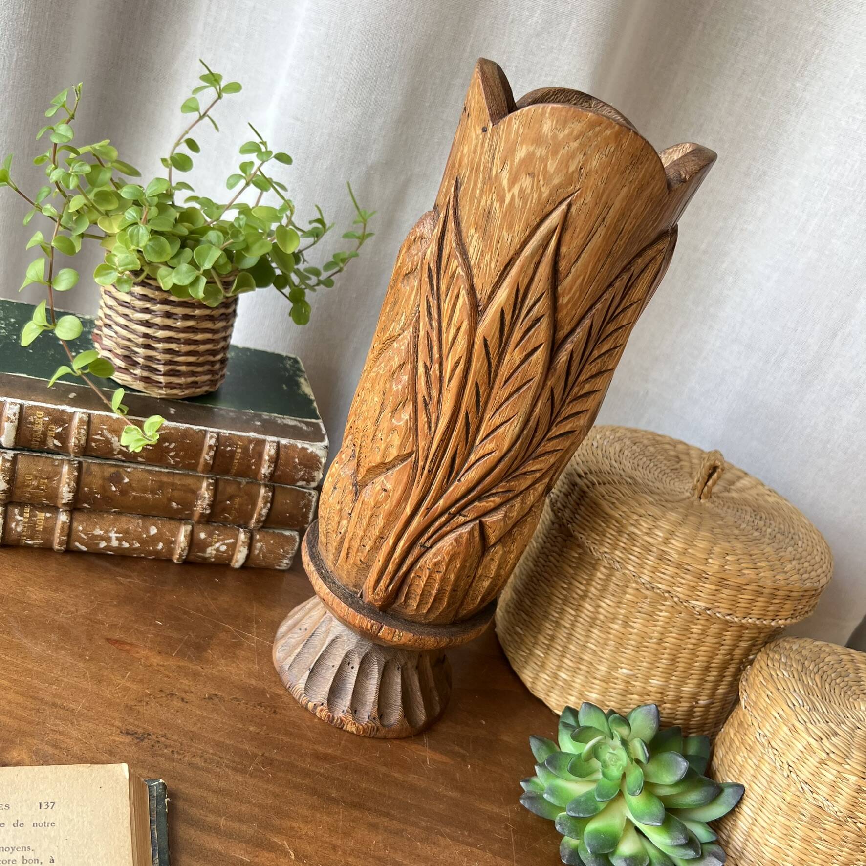 Large sculpted vase made of solid wood