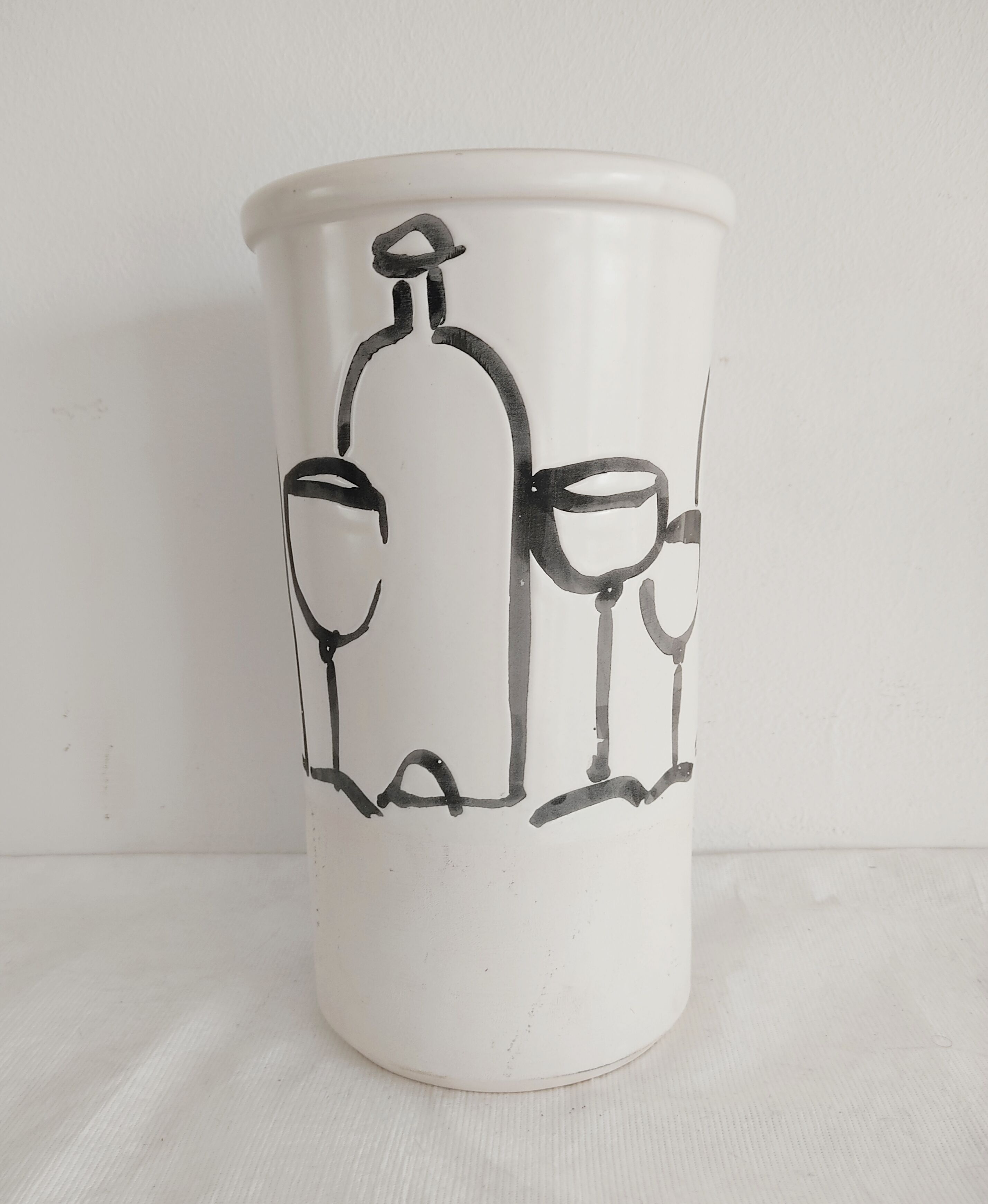 Vase decorated in hollows of bottles and glasses