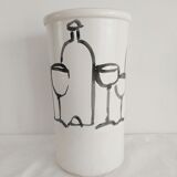 Vase decorated in hollows of bottles and glasses