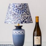 Mid-century modern blue ceramic table lamp with new Liberty London floral shade.