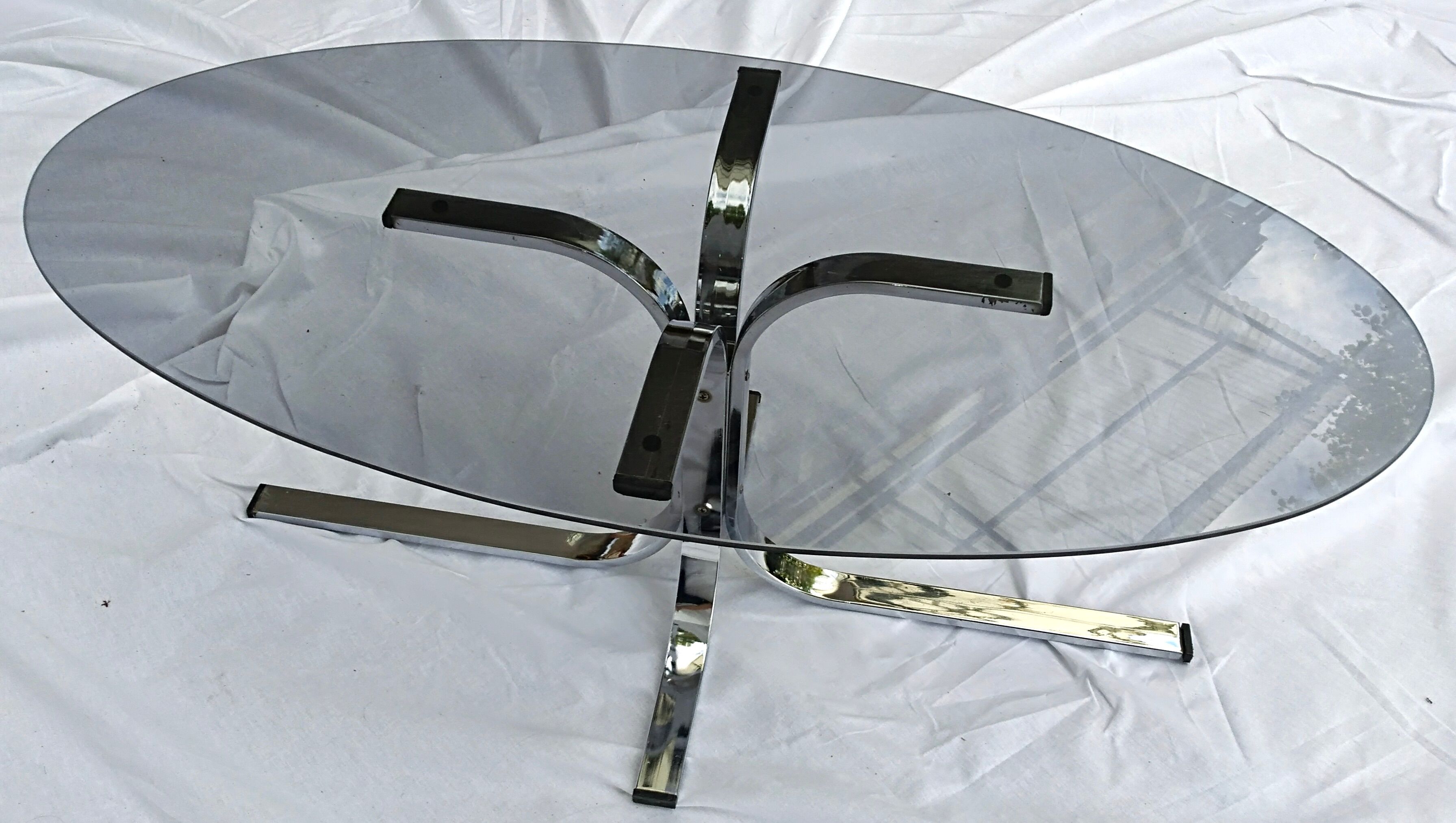 Oval glass coffee table smoked glass chromed metal