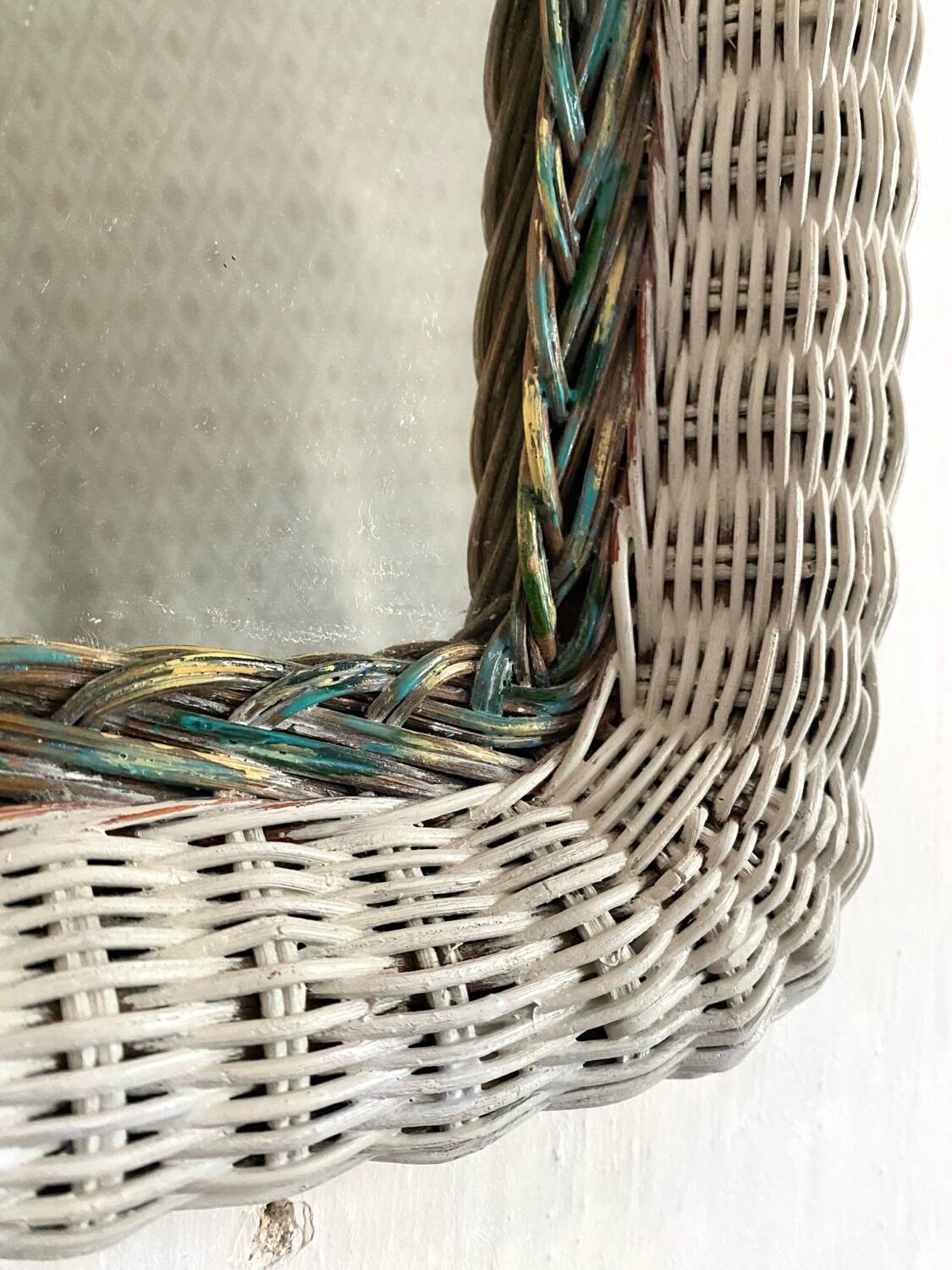 Vintage woven rattan mirror