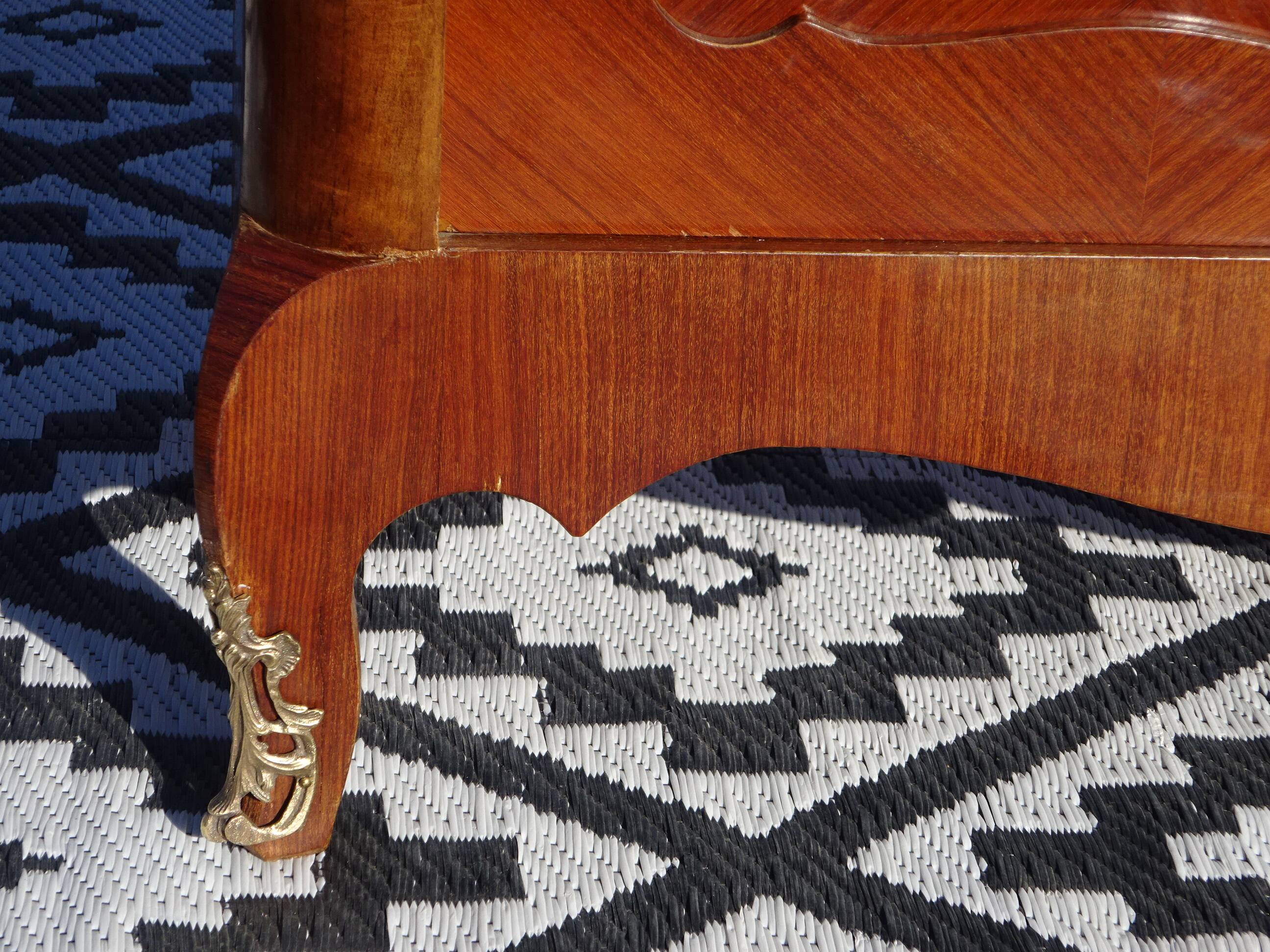Glass library with rosewood marquetry in the Louis XV style.