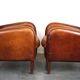 Set of 2 subtle sheepskin leather armchairs with a beautiful warm color scheme