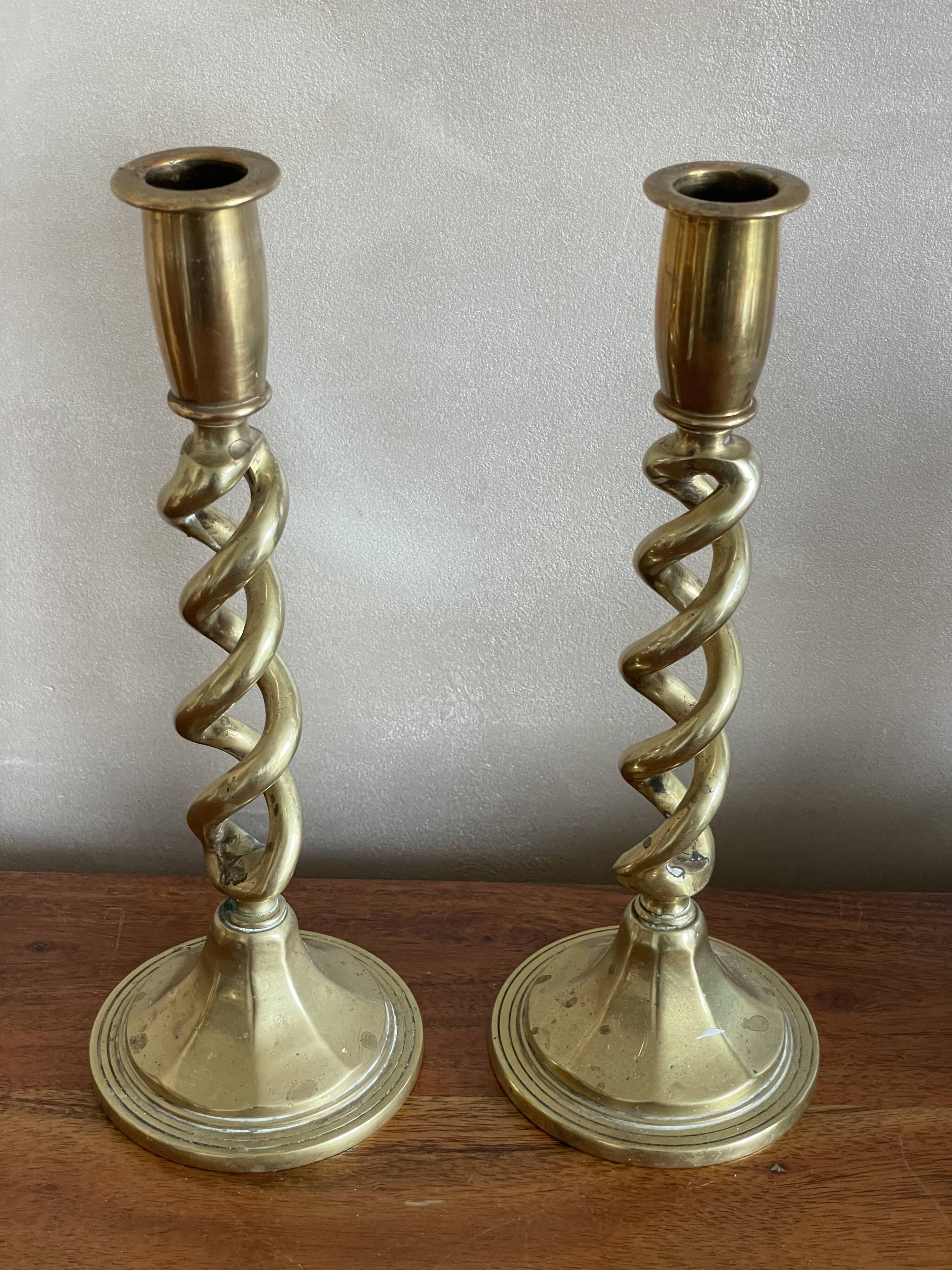 Duo of twisted brass candle holders