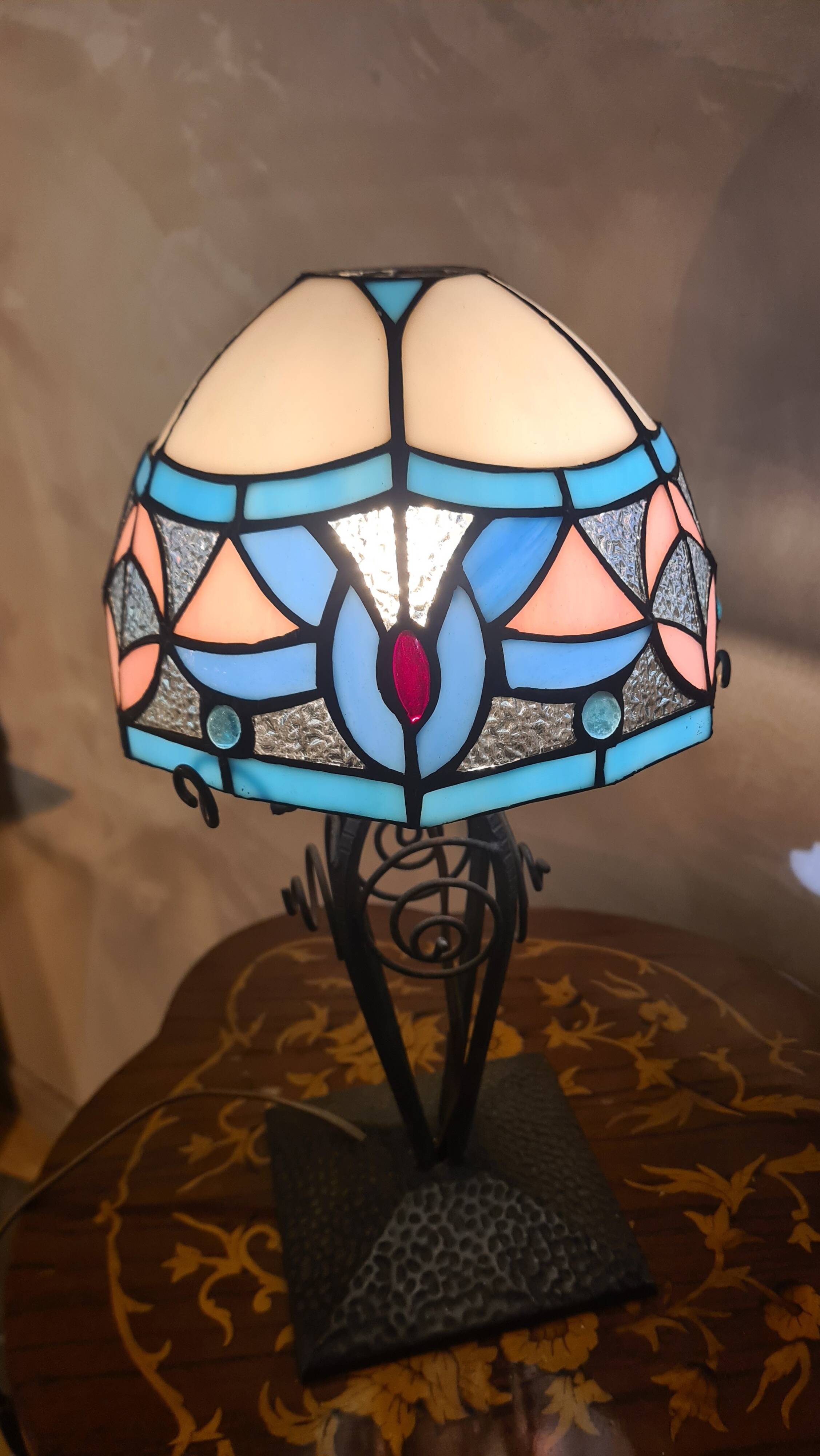 antique wrought iron lamp, 1900 to 1930 with stained glass lampshade soldered with lead