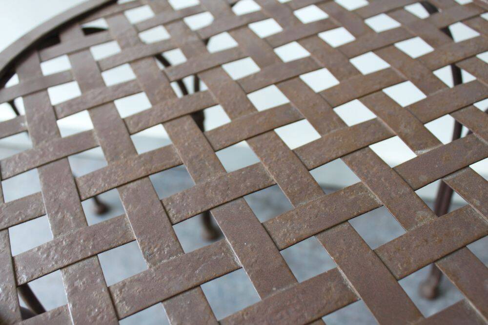 Set of 4 wrought iron chairs.