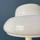 Mid-century mushroom floor lamp with a white plexiglass shade.