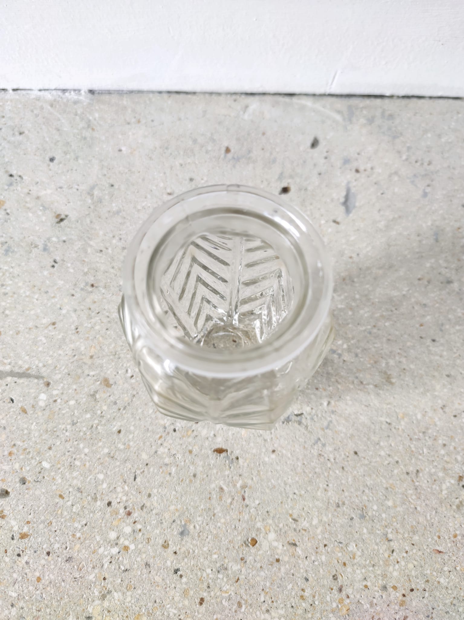 Small transparent molded glass vase