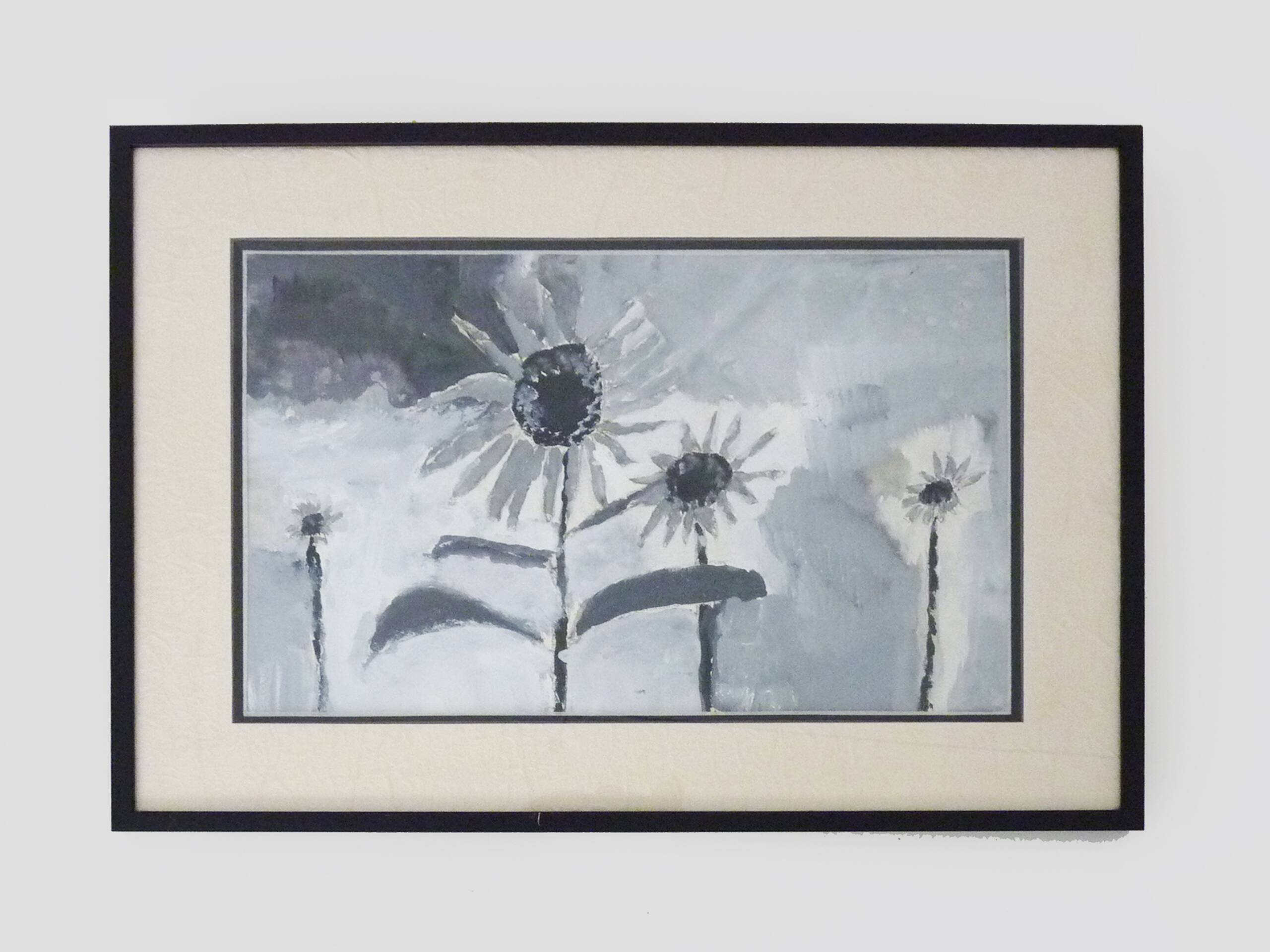 Framed painting with gray flower decor.