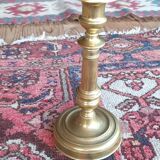 Bronze candlestick or torch holder from the Louis XIV period, France, 17th century.