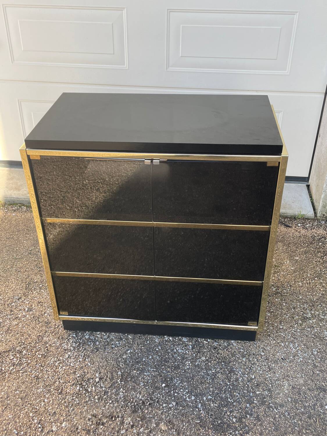 Vintage black and gold TV cabinet from the 70s/80s
