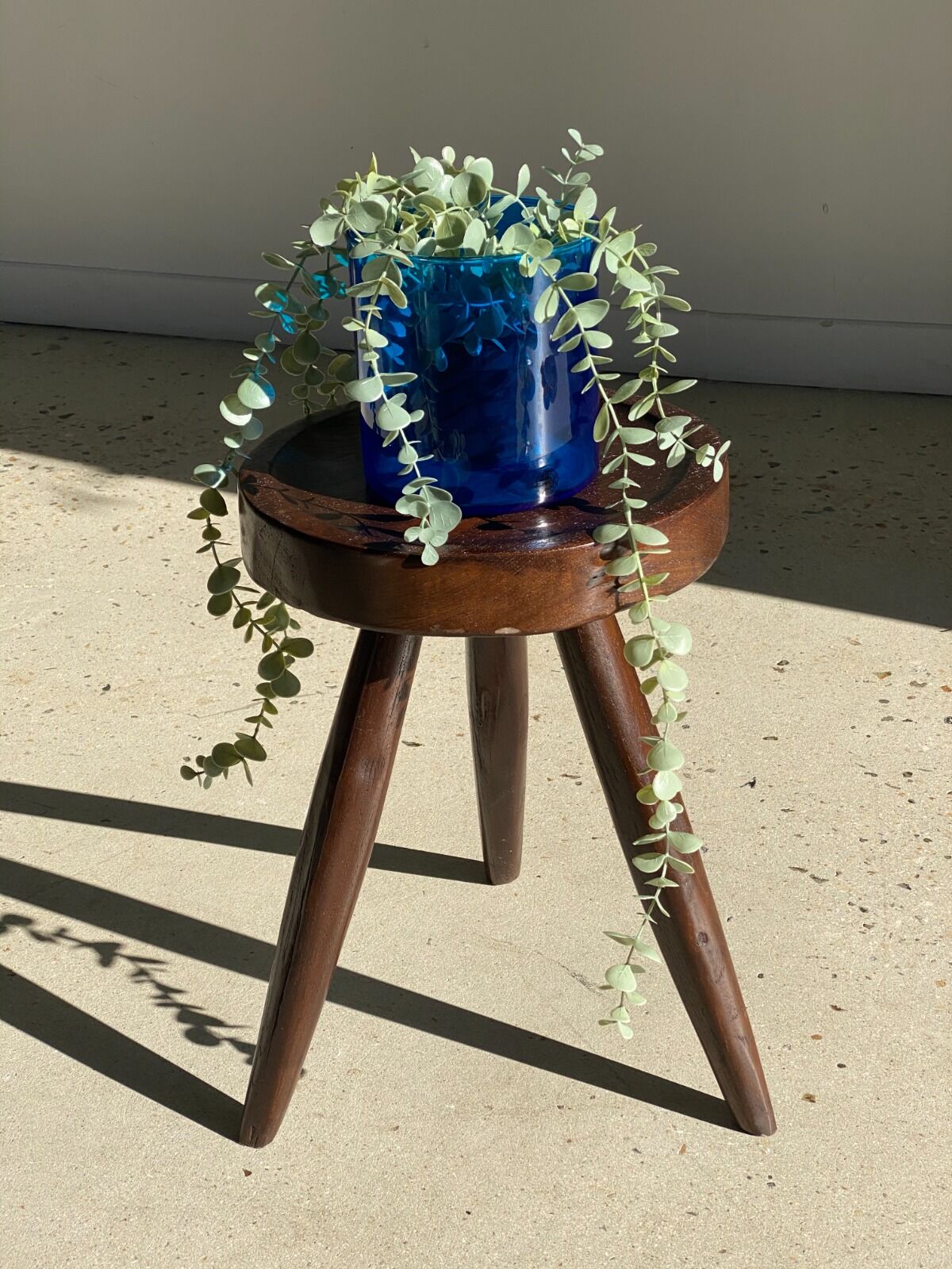 Brown solid wood stool seated circular dug
