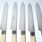 Series of 6 retro table knives in steel and ivory cracked lacquer 1940