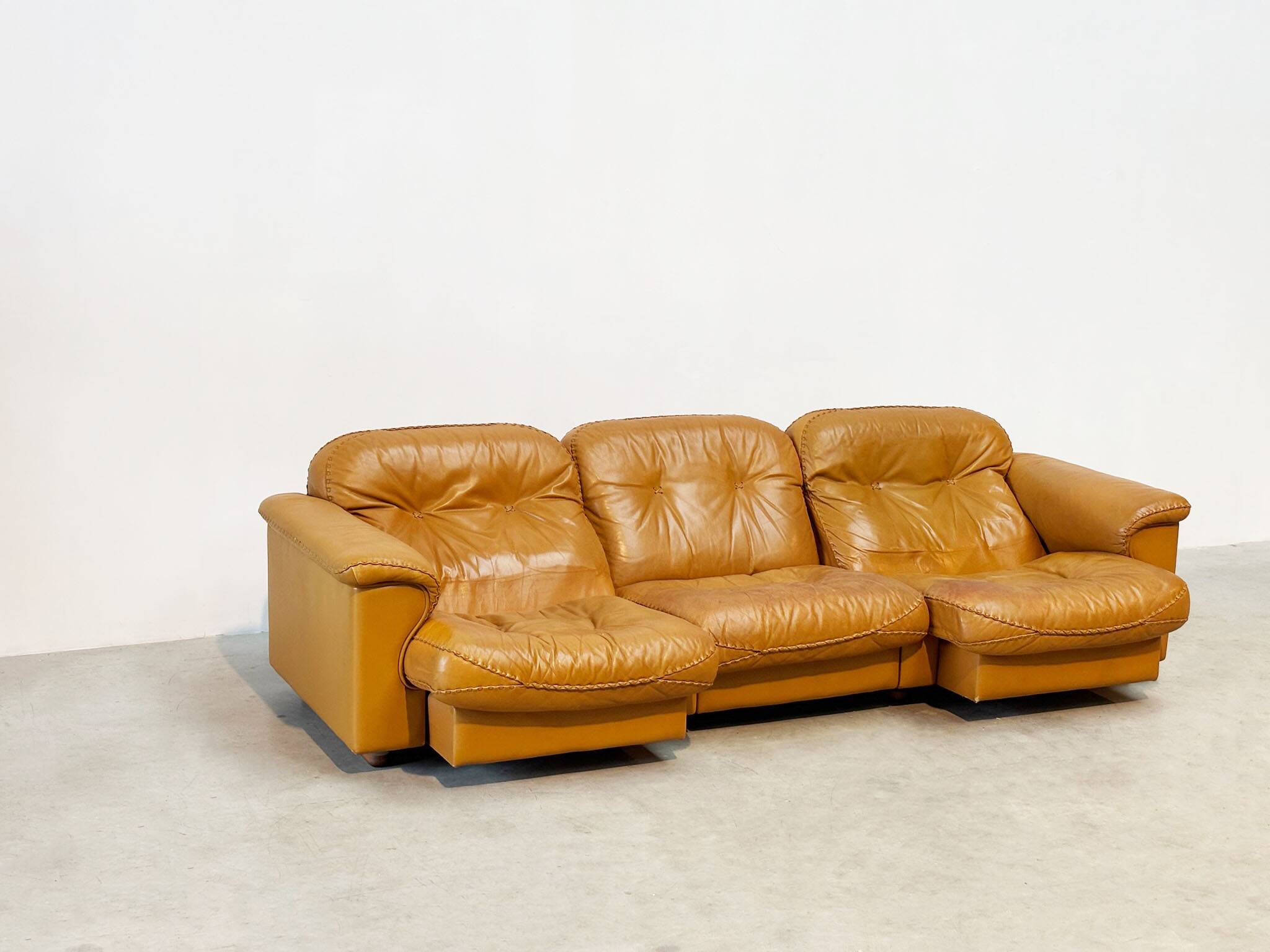 De Sede DS101 three-seater in cognac leather.