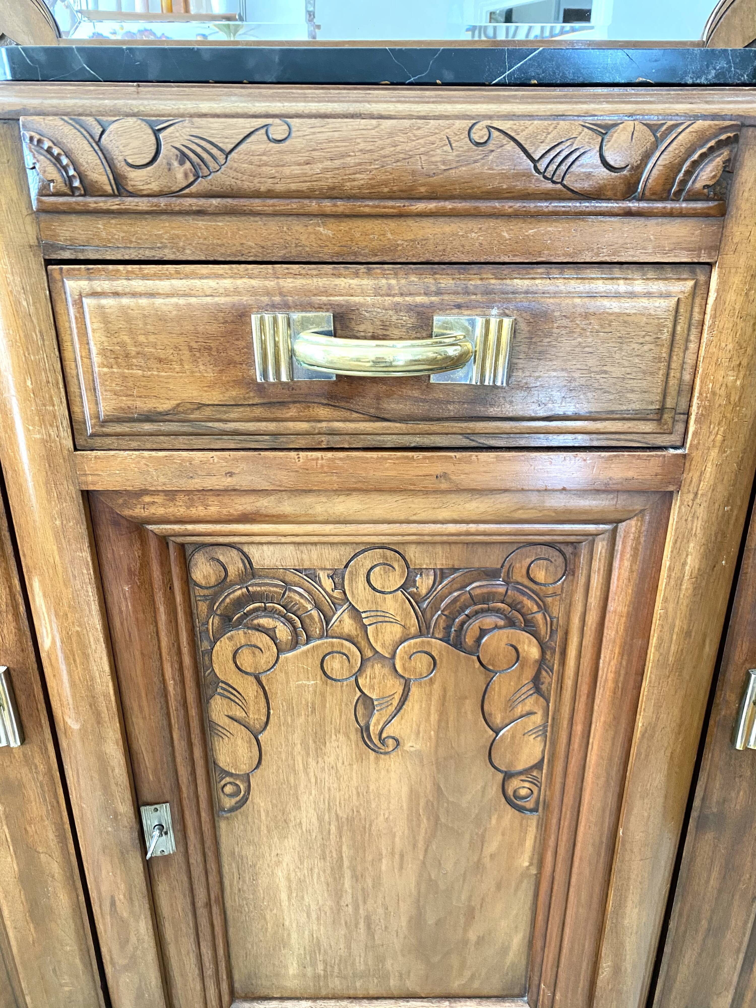 Art Deco black marble sideboard and vintage beveled mirror