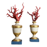 Pair of red corals on gilded and blue wooden bases