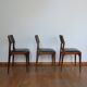 Series of 3 Scandinavian teak and skai chairs