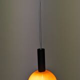 Pair of orange opaline ball pendants by Parscot, France circa 1970.