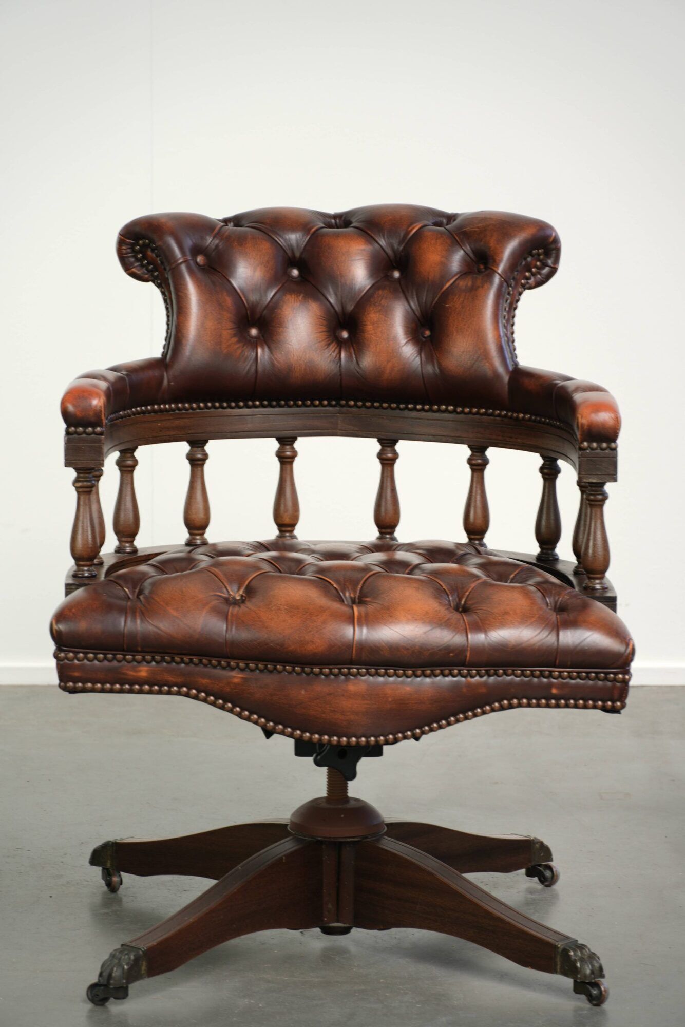 English cowhide Chesterfield swivel and tilt button seat office chair