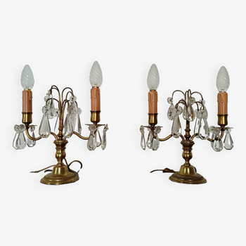 Pair of bronze girandoles with crystal pendants, two arms of lights.